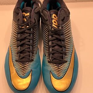 Nike Men's Black and Gold Athletic Shoes with Blue Soles